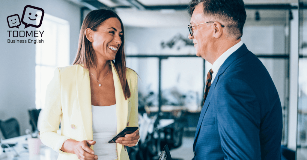 Office conversation taking place between a man and woman. Toomey Business English.