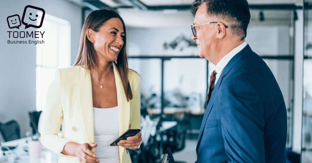 Office conversation taking place between a man and woman. Toomey Business English.
