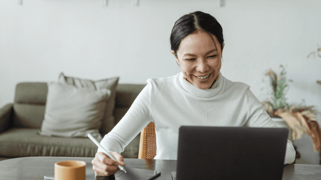 Woman learning online Business English coaching.